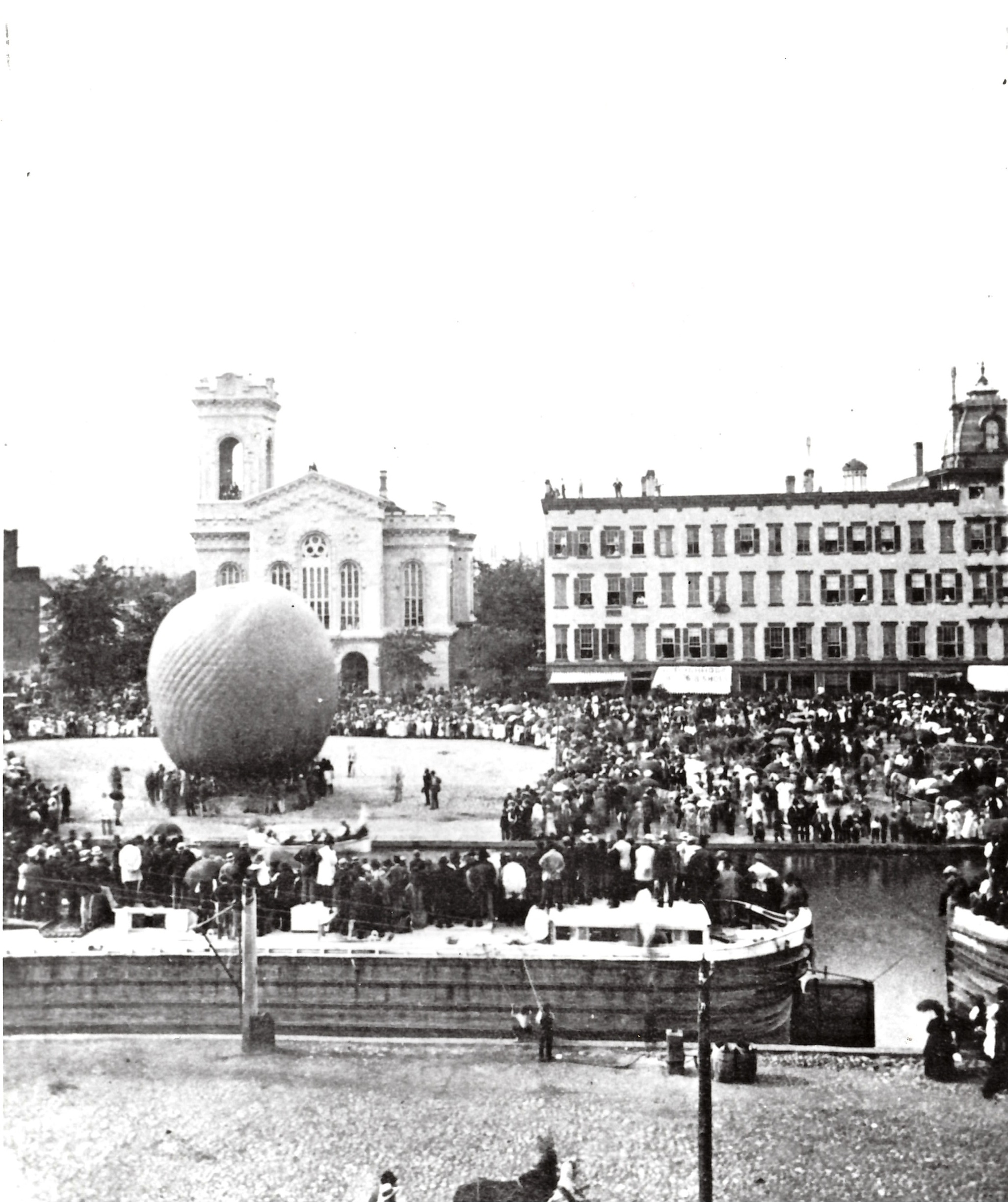 Hot air balloon launch in Clinton Square, downtown Syracuse, 1870s. 